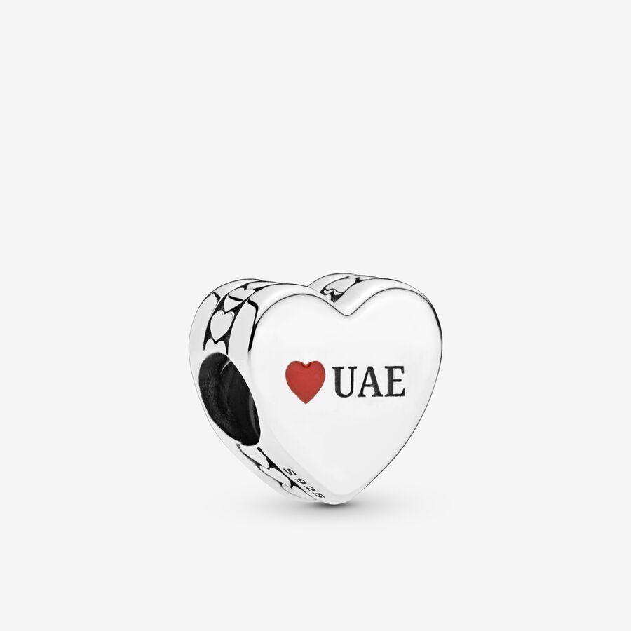 UAE silver charm with red enamel image number 0