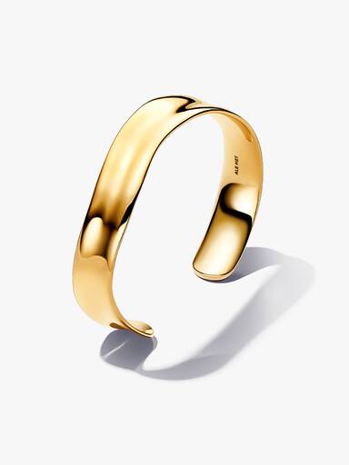 Pulseira aberta larga com design orgânico